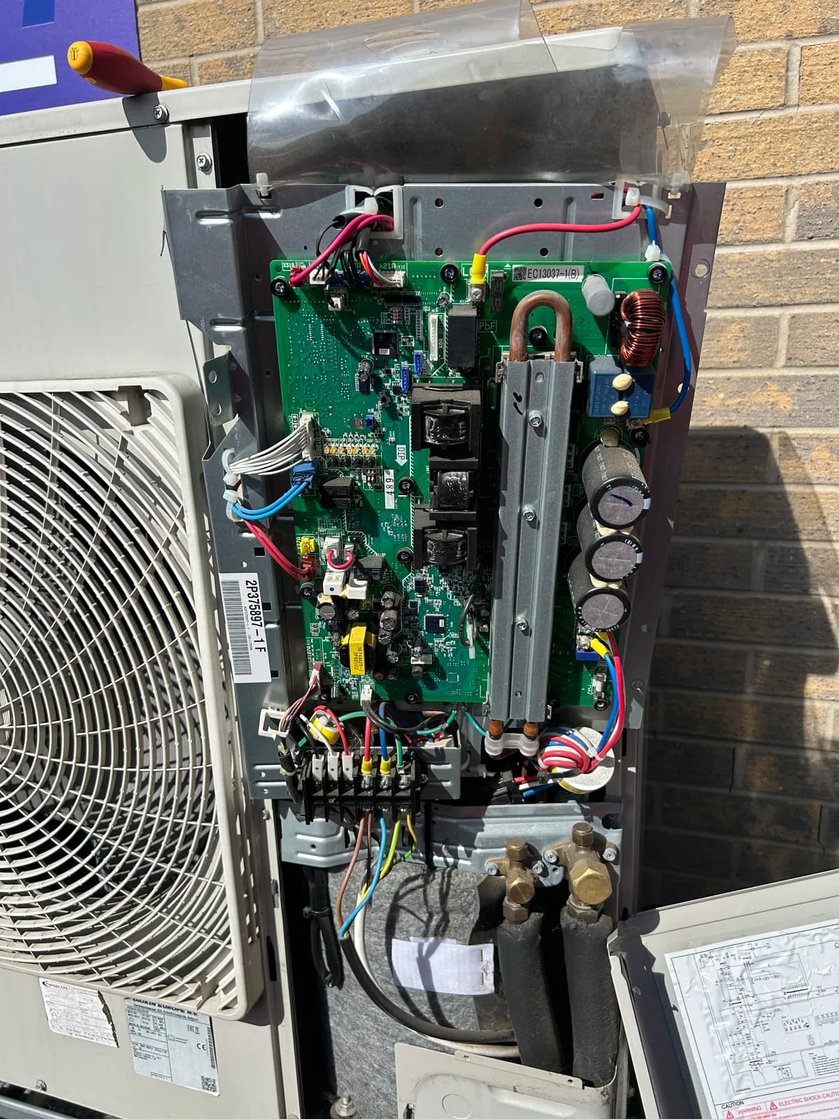 Outdoor air-conditioning unit opened for a repair